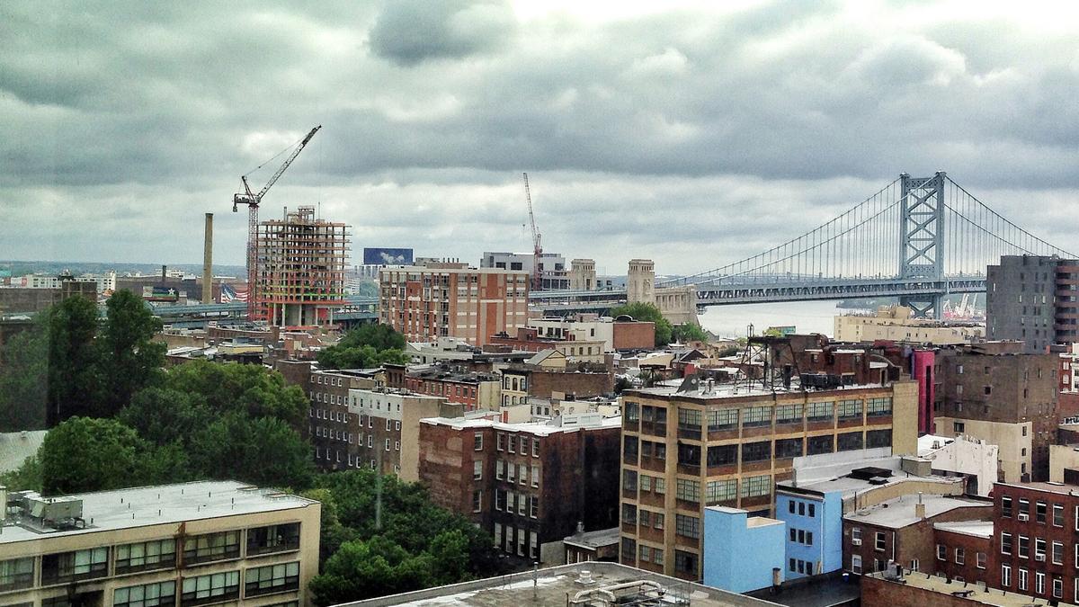 Topping off at the Bridge apartments marks milestone that was long in