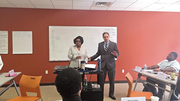 Sheila Ireland and Matt Bergheiser conducting a jobs training class.