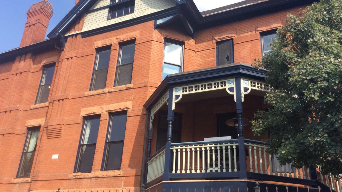 DBJ Offices Tour Denver's Atlas Real Estate Group, in a landmark