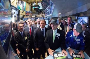 Former Violin Memory CEO Donald Basile, center with the blue cap, was on the floor of the New York Stock Exchange on Friday when his company's stock started trading for the first time.