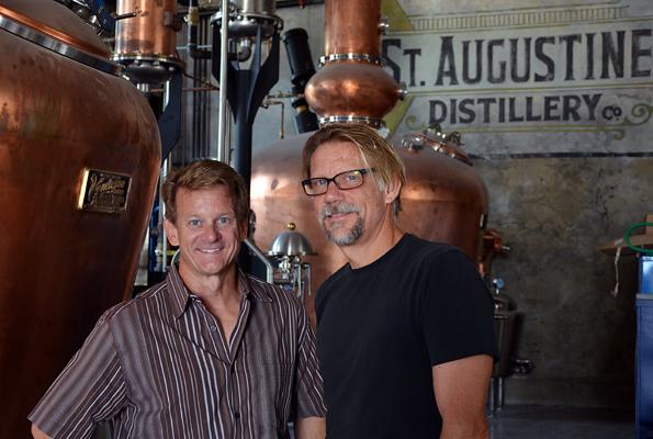 Michael Diaz, left, and Philip McDaniel stand inside of the St. Augustine Distillery.
