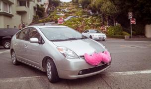 Lyft's ride-share cars can be easily spotted by large pink mustaches.