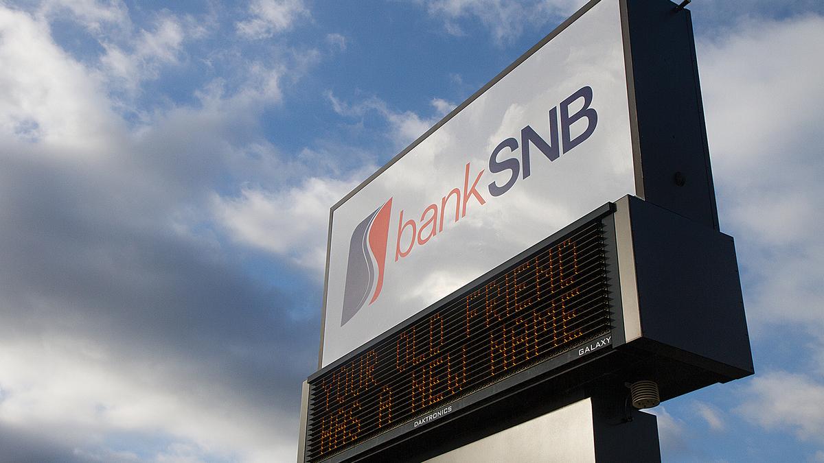 Bank Snb Parent Completes Acquisition Of First Commercial