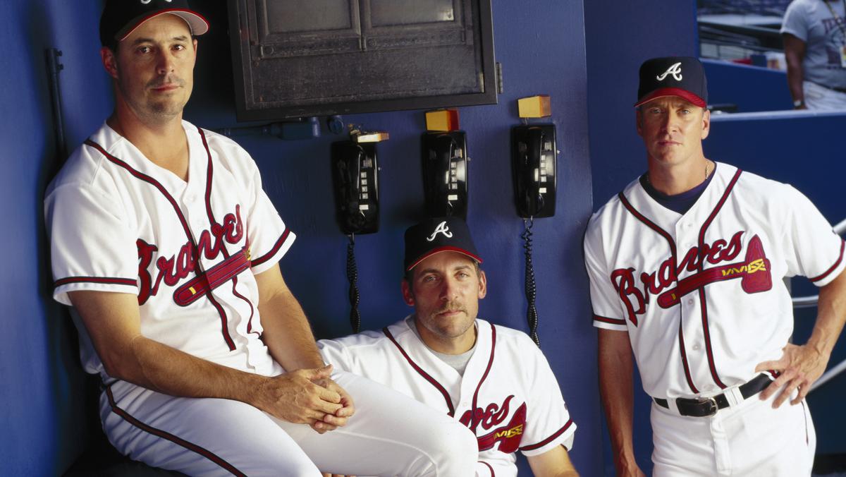 Greg Maddux, Tom Glavine, & John Smoltz Baseball Hall Of Fame Jersey Beckett