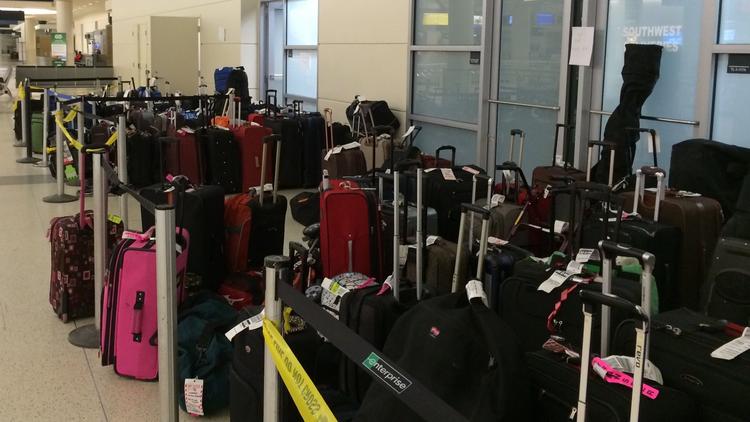 Southwest Airlines baggage claim area at Midway has scores of bags still - Chicago Business Journal