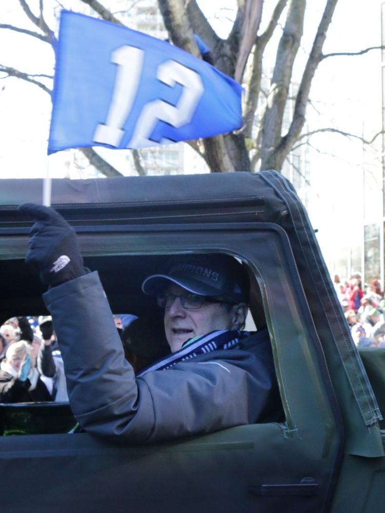 Seahawks honor Paul Allen with 12th Man flag raising at first home