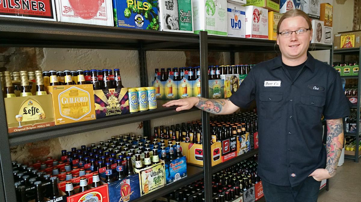Beer Co., a "drink in" craft beer store, opens in downtown Greensboro