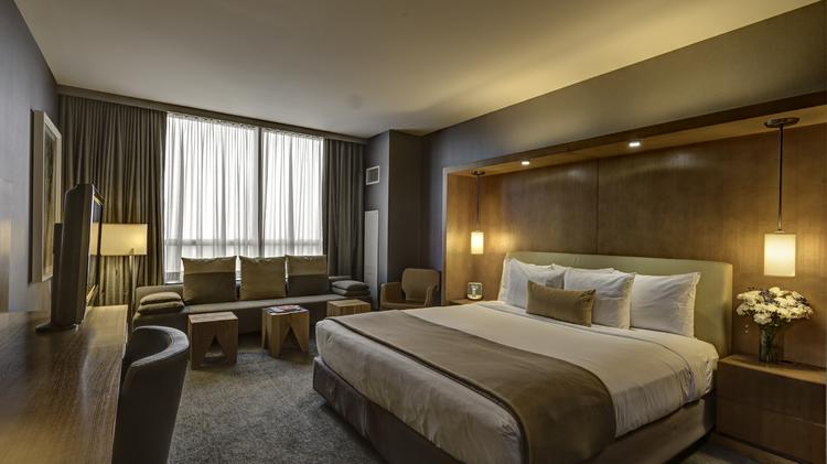 Loews Hotels To Acquire O Hare Airport Convention Hotel Chicago A Guestroom At The Intercontinental Chicago O Hare Hotel Which Has Been Acquired By