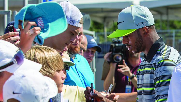 Chris Paul signing autographs at the Wyndham Championship.