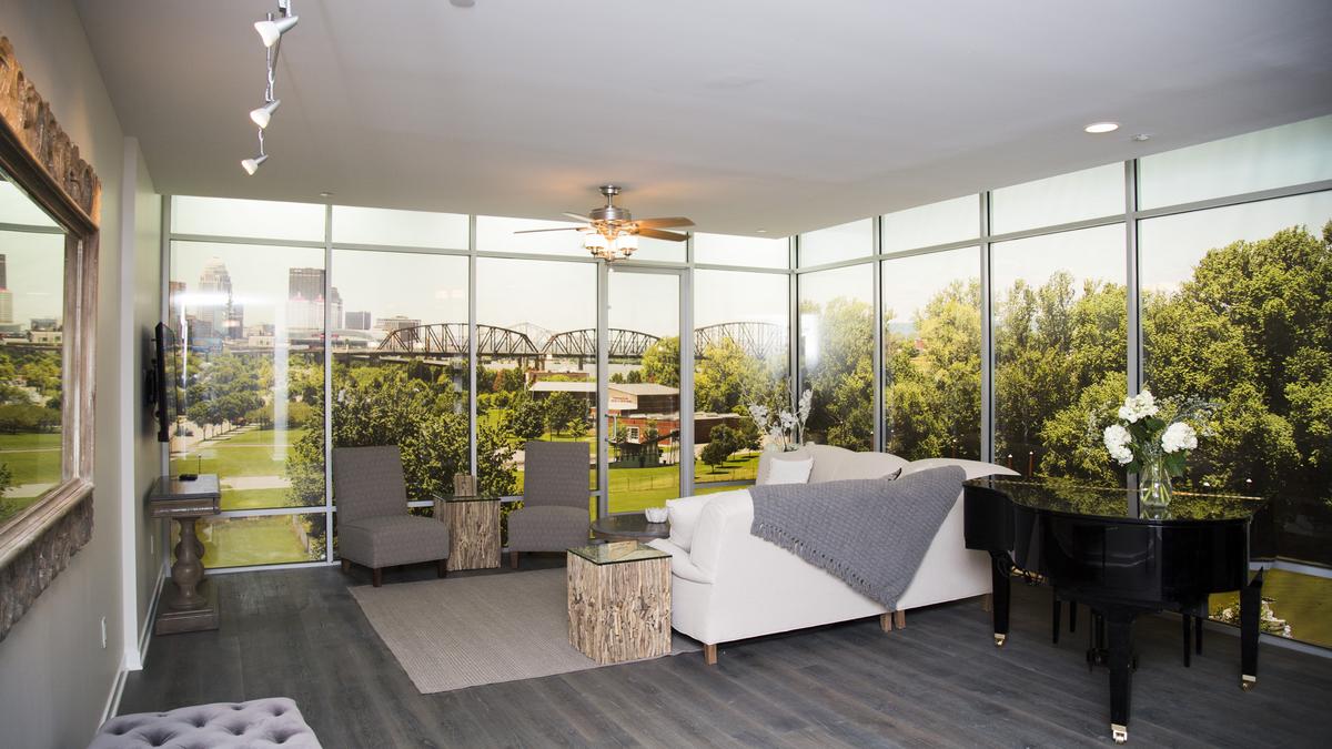 Poe Companies shows off model unit for its 16story condo tower on