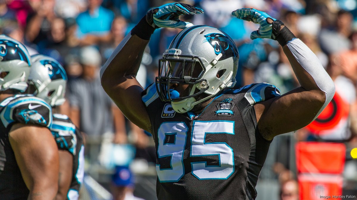 Carolina Panthers defensive end Charles Johnson (95) watches