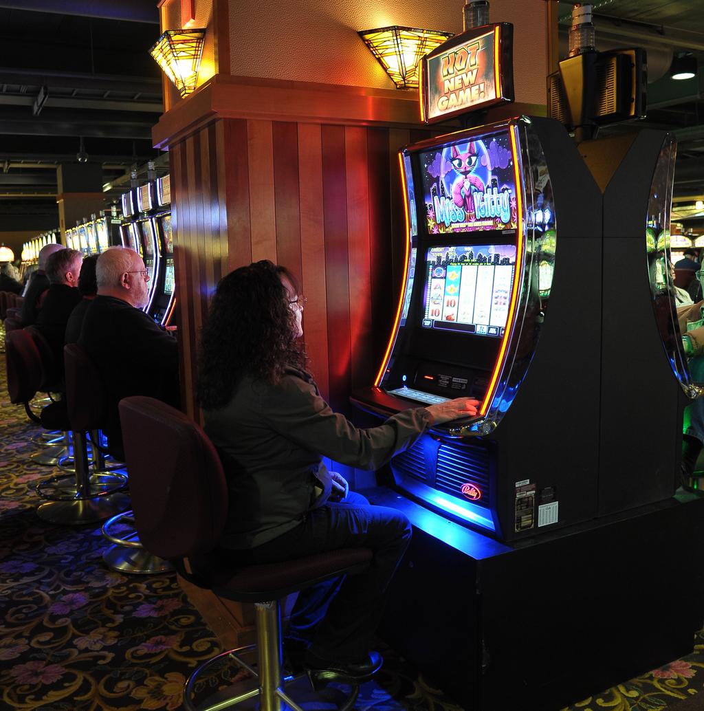 Locate slot machines at casinos