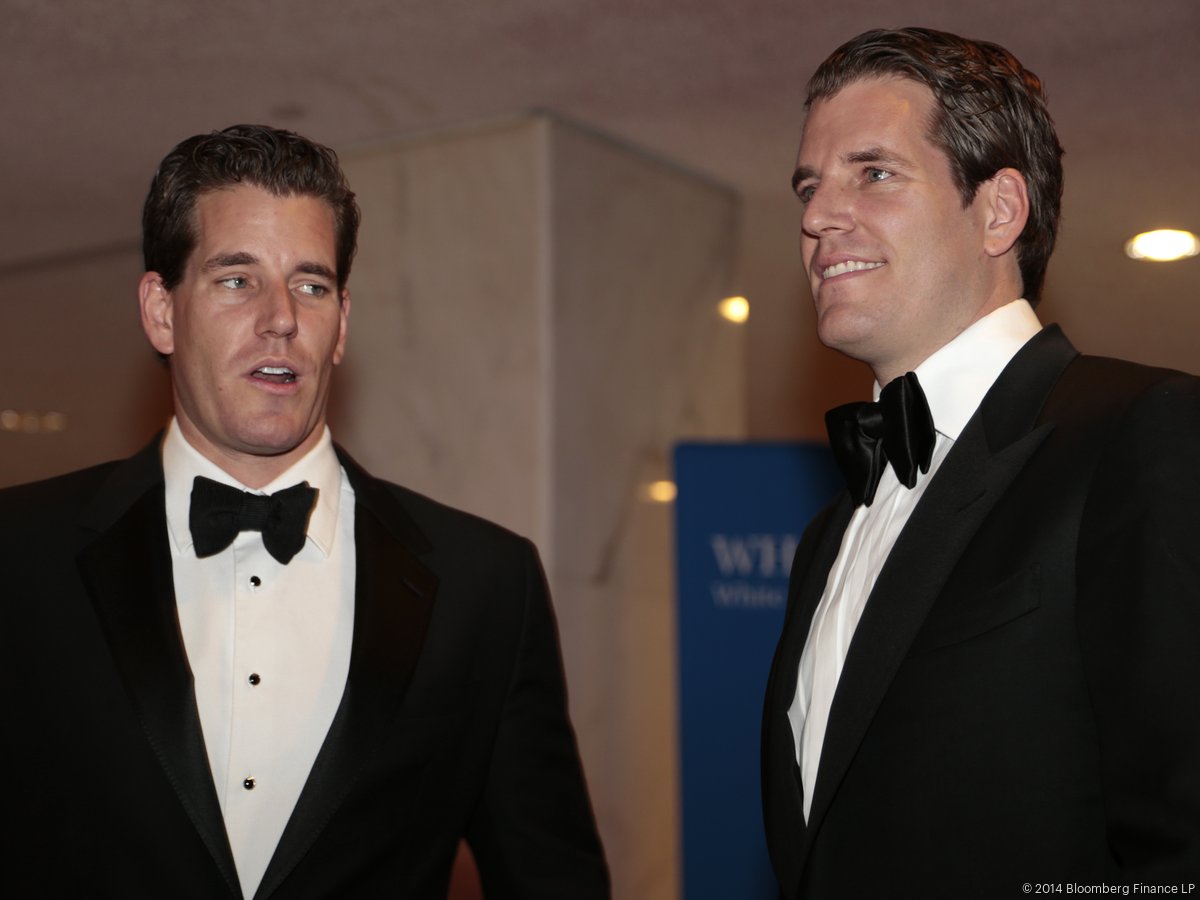 Winklevoss brothers cede $18M bitcoin auction to Tim Draper and others