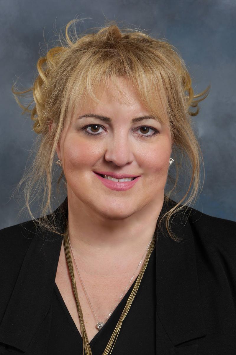 Panasonic's Julie Bauer tests out a Kentucky Derby video Bizwomen