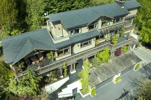 An aerial view of OB Jacobi's elegant Craftsman-style Seattle home on a private lane in Laurelhurst. The 6,100 square foot home, which this president of Windermere Realty  built 11 years ago, just went on the market for $3.25 million. Photo: VHT