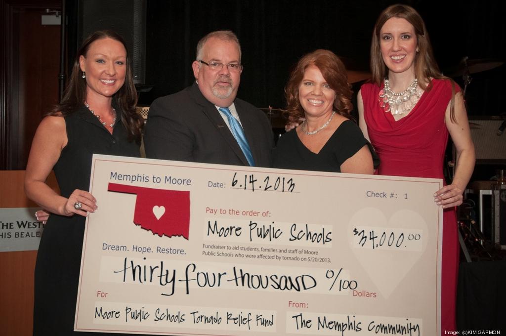 Memphis To Moore Fundraiser Pulls In Cash For Tornado Victims Hether Little Left Moore School Teacher Accepted A Check On Behalf Of