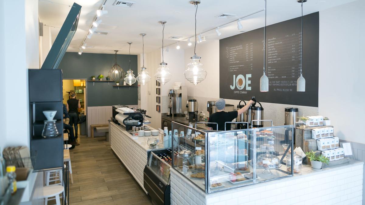 This once 'miserably unhappy' entrepreneur builds boutique coffee chain - Upstart