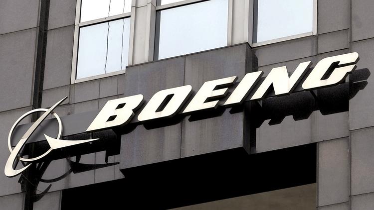 Boeing signage is seen displayed on its building in Chicago. Photographer: Tim Boyle/Bloomberg News