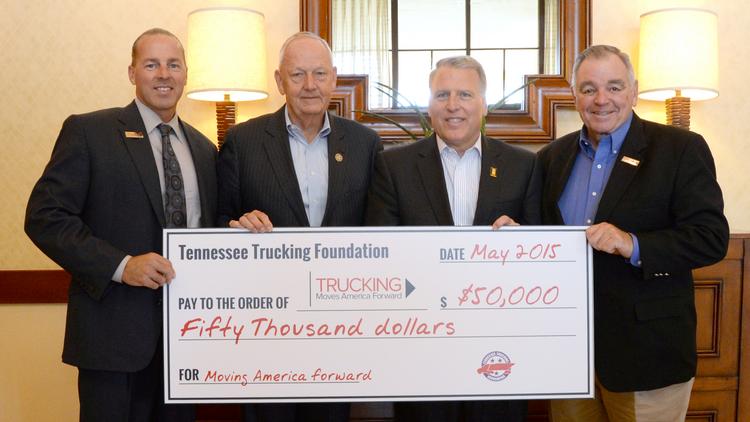 (Left to right) Scott George, CEO of Tennessee Commercial Warehouse, Tommy Hodges, Titan Transfer chairman and TTF, Dave Manning, TCW president and American Trucking Associations vice chairman and Bill Reed of Skyline Transportation present the $50,000 contribution to Trucking Moves America Forward.