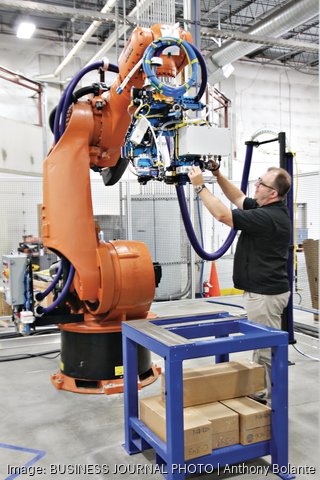 KUKA Systems robot and automated manufacturing technologies