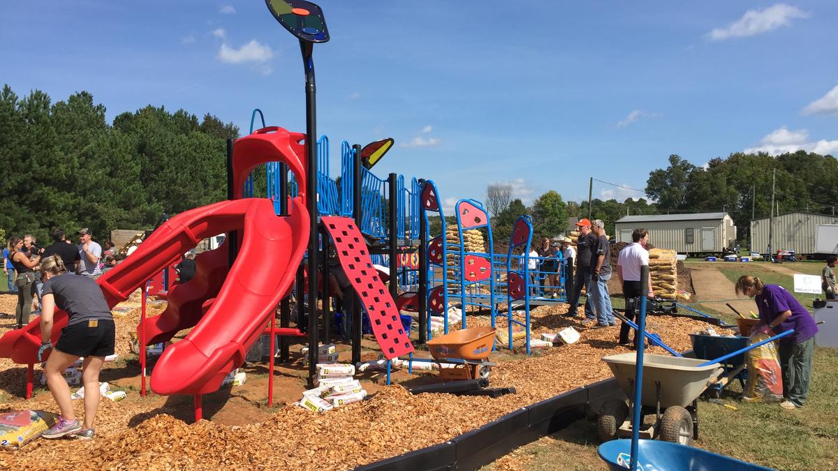 Charlotte's business community builds playground for Highland Renaissance Academy Charlotte