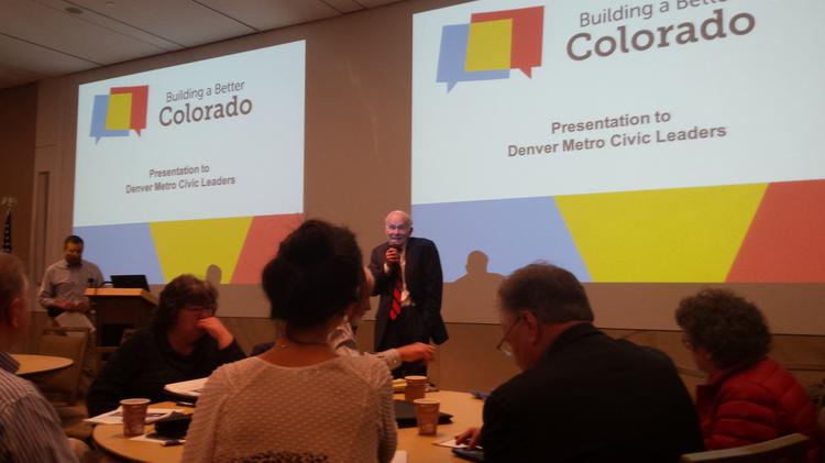Dan Ritchie, one of the leaders of the Building a Better Colorado initiative, explains the effort to a crowd at a Nov. 16 meeting in Denver.