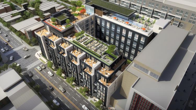 The rooftop of 880 P, part of CityMarket at O from Roadside Development, will include a 16-foot tall waterfall, organic garden and reflection pool.