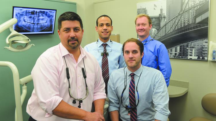 Beck Pearce Dental includes, from left, Dr. David Beck, Dr. Devin Bateman, Dr. Jim Simpson and Dr. Troy Pearce.