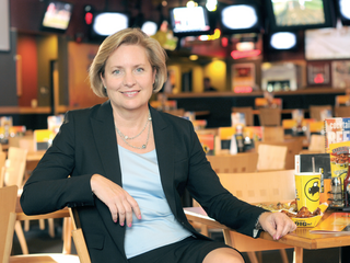 MINNEAPOLIS: Buffalo Wild Wings CEO Sally Smith's payday