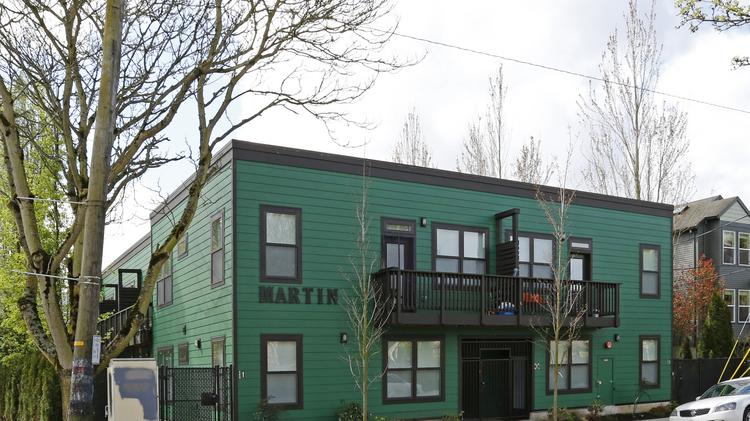 The Martin, a 14-unit apartment in Northeast Portland, is part of a three-building portfolio that just sold for $9.05 million.