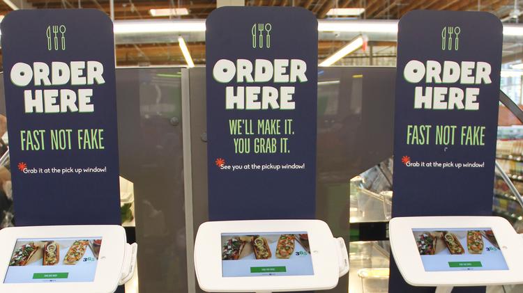 Ordering kiosks for prepared foods at the new 365 by Whole Foods store in California.