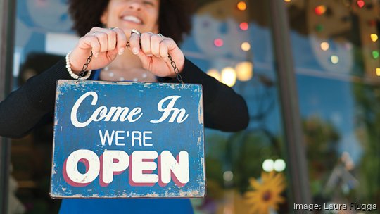 Woman with Open Sign