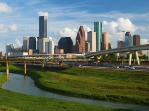 "Houston skyline, freeway, and river"