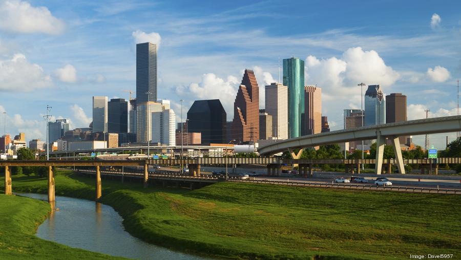 "Houston skyline, freeway, and river"