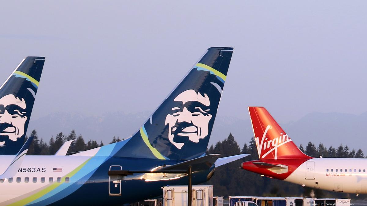 Alaska Air Group passenger traffic on the rise, but on-time flights hit ...