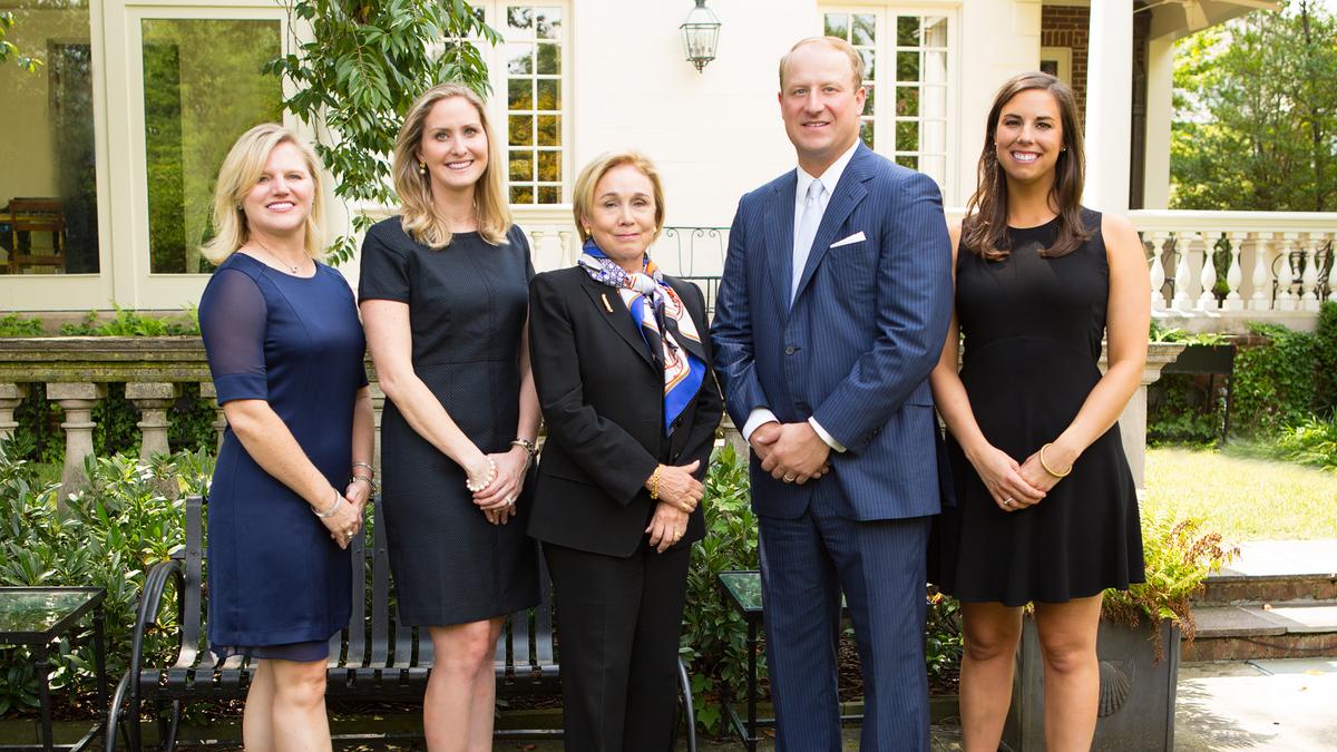 Topselling team out at Compass, some returning to Washington Fine