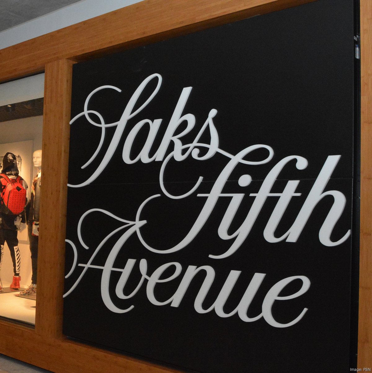 Saks sued by hair salon over co-working plan at flagship