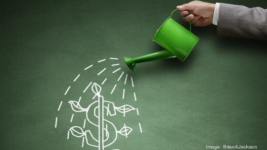 Thinkstock Money Watering Business concept