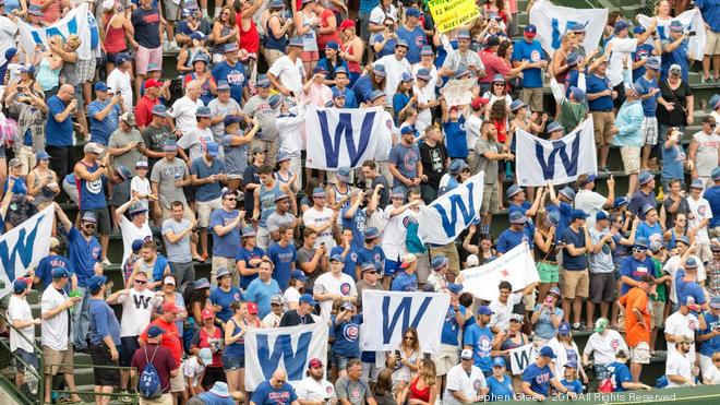 Chicago Cubs fans Fly the W as long as they can