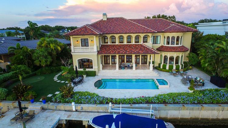 The home at 4942 Saint Croix Drive is more than 8,000 square feet and features deep water access and unobstructed bay views. Click through for a virtual tour of the property.