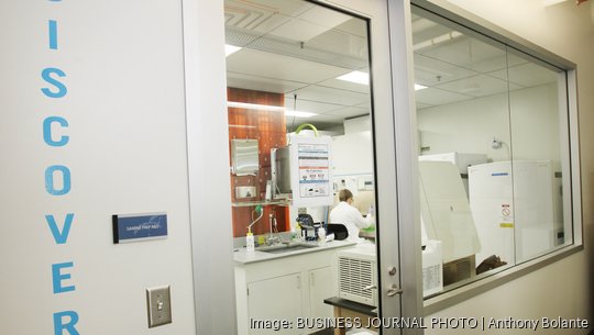 Adaptive Biotechnologies Chad Robins and his older brother Harlan Robins, are pictured in their company's swank newly expanded headquarters in the Eastlake neighborhood of  Seattle, Wash