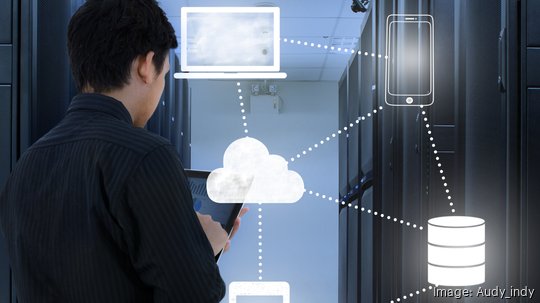 Business man working in data center with cloud technology