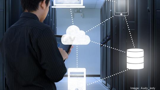 Business man working in data center with cloud technology