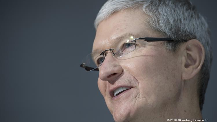 Tim Cook, chief executive officer of Apple Inc., speaks with attendees during an event in San Francisco, California, U.S., on Wednesday, Sept. 7, 2016. Apple Inc. unveiled new iPhone models Wednesday, featuring a water-resistant design, upgraded camera system and faster processor, betting that after six annual iterations it can still make improvements enticing enough to lure buyers to their next upgrade. Photographer: David Paul Morris/Bloomberg