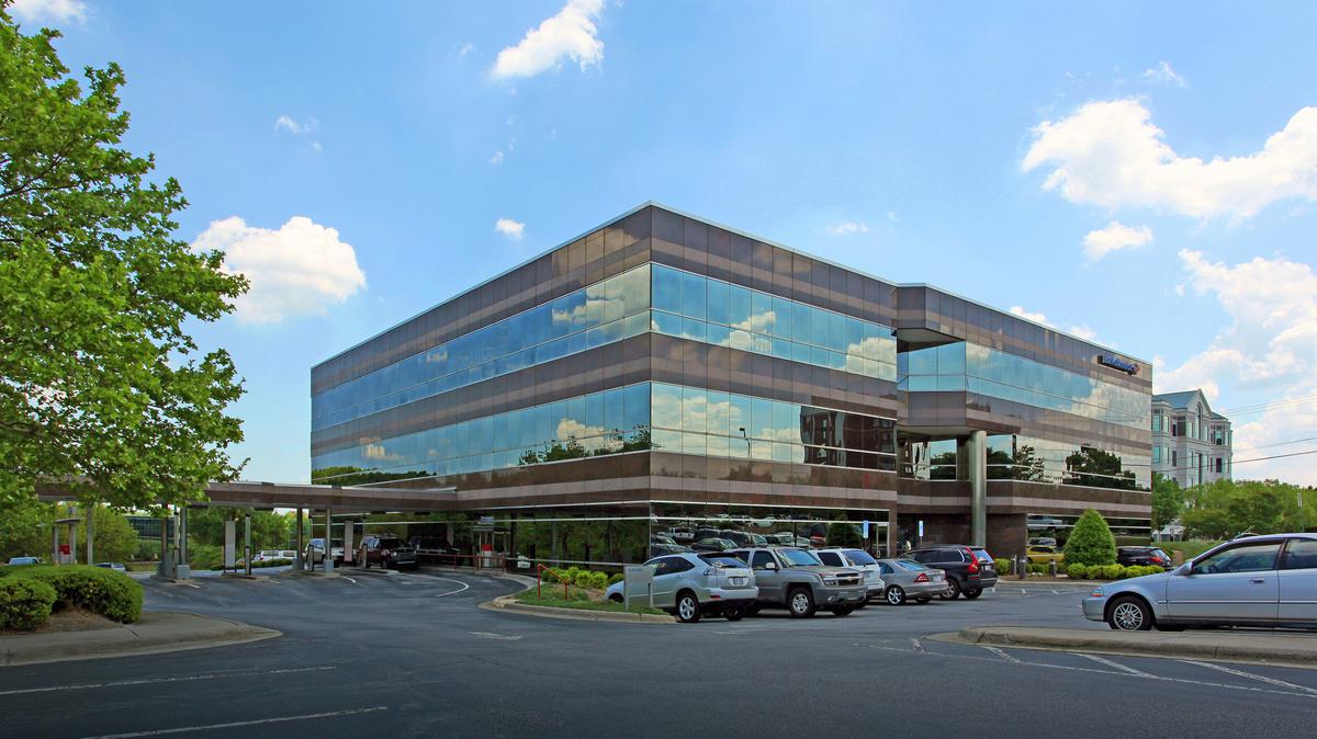 Investors buy four Green Valley office buildings near Friendly Center ...