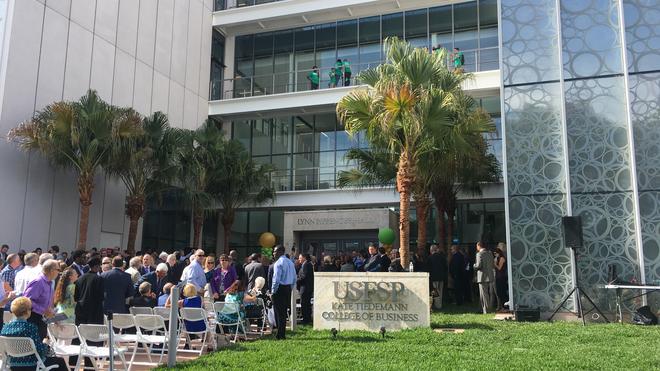 Community and business leaders celebrate the grand opening of Lynn Pippenger Hall for the Kate Tiedemann College of Business at the University of South Florida St. Petersburg. JANELLE IRWIN