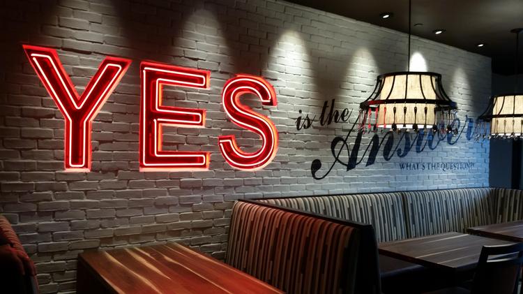Cameron Mitchell Moves Into New Arena District Offices Columbus An Aspirational Message On The Wall At Cameron Mitchell Restaurants Offices In Arena District