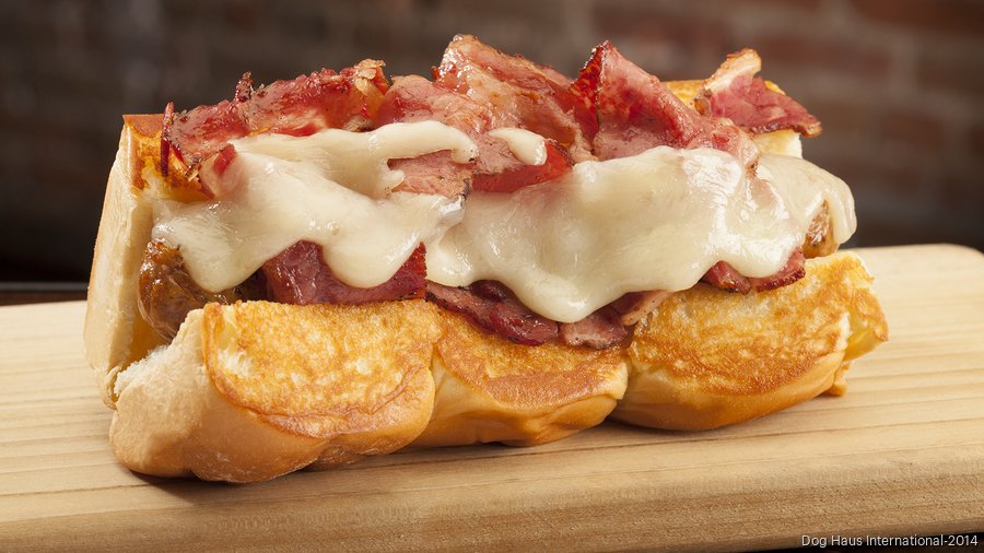 Gourmet hot dog restaurant Dog Haus hauling buns to Richardson Dallas