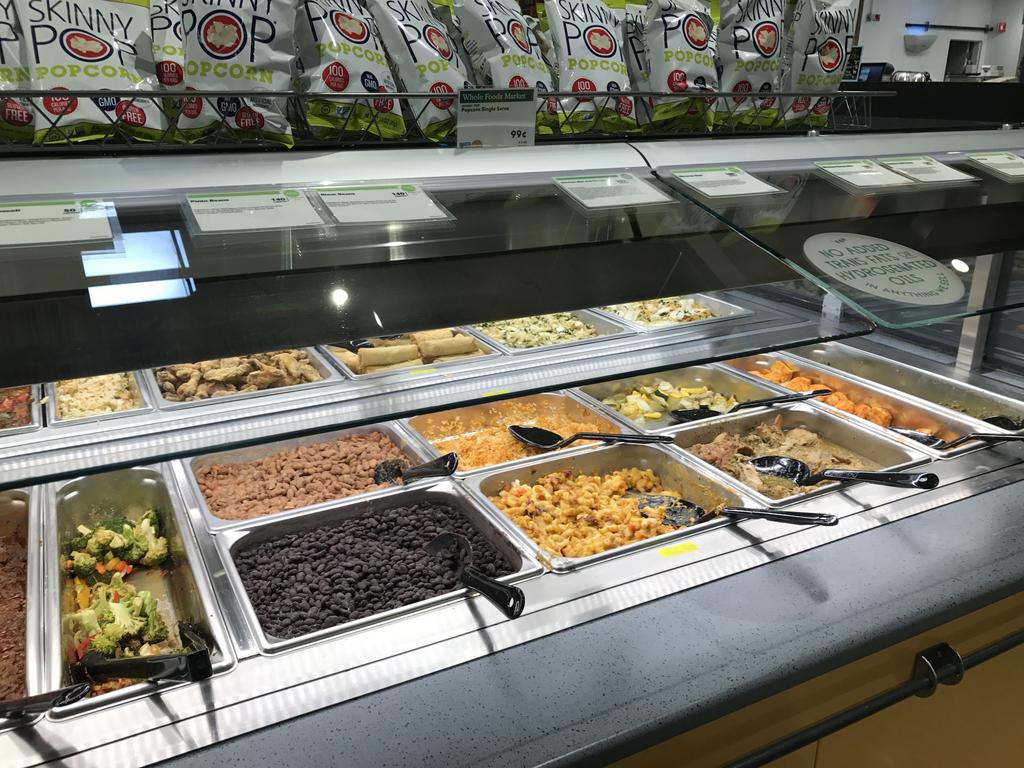 https://media.bizj.us/view/img/10391177/whole-foods-prepared-foods-table.jpg