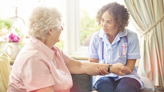 Nurse with a senior woman